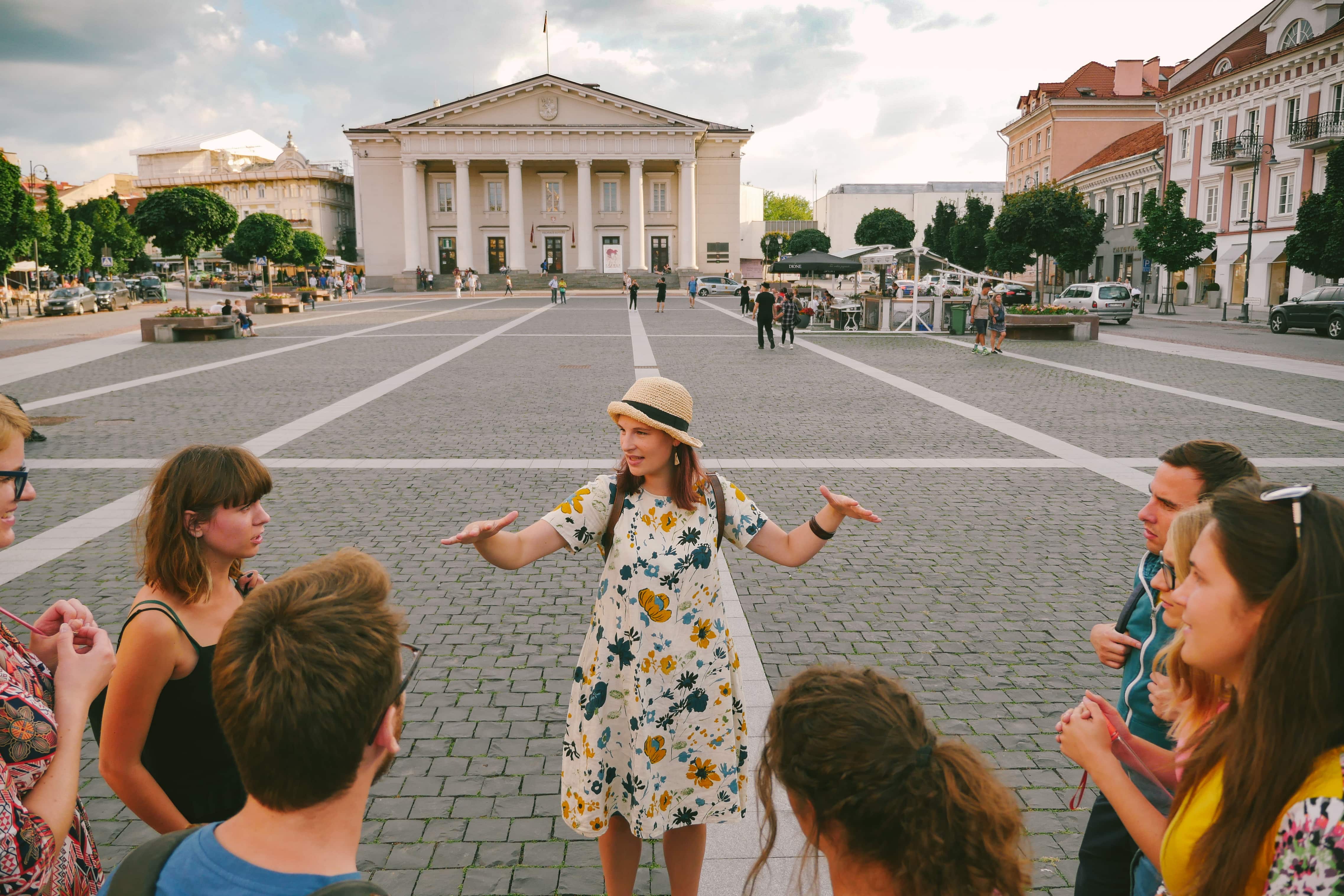 Picture of our tour guide with a group of tourists in Vilnius